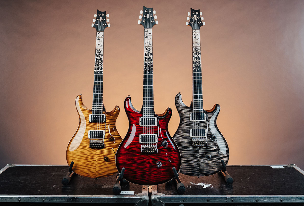 PRS Custom 24 "Birds of a Feather" shown in Blood Red, Charcoal Microburst, and Honey Gold